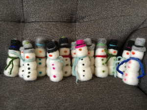 Handfelted snowmen made from Montana wool. Decorate for the holidays
