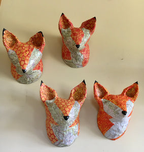 Fox sculpture made from topo maps of Montana, recycled paper and batik fabric. Upcycled and recycled materials. one of a kind, made in Montana.